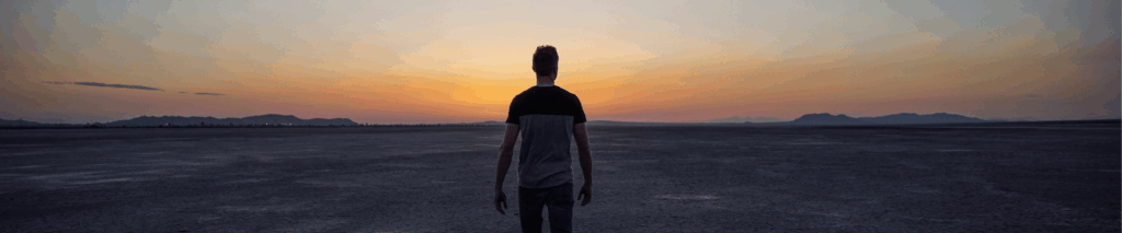A man walking alone, symbolising mental health struggles